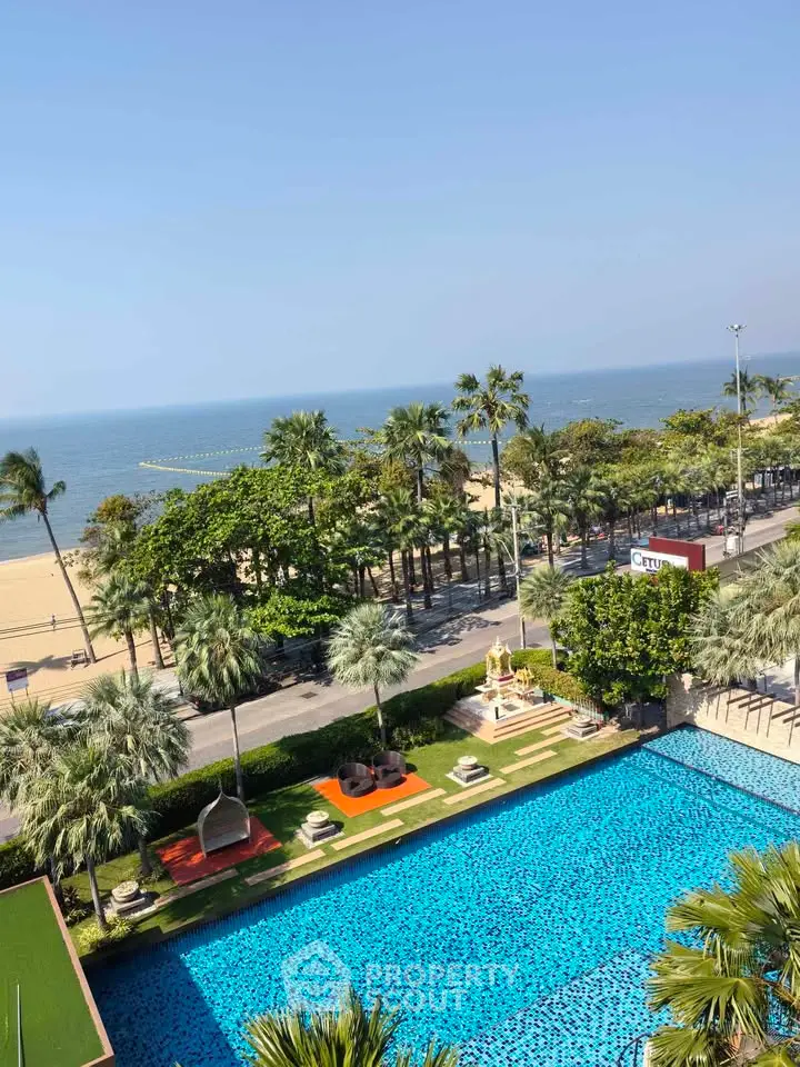 Stunning beachfront property with pool and ocean view, perfect for luxury living.