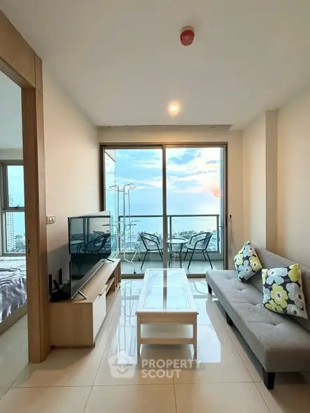 Modern living room with stunning ocean view and stylish decor