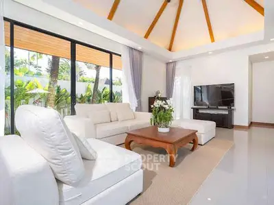 Luxurious living room with high ceilings and modern decor