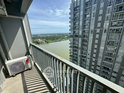 Stunning high-rise balcony with panoramic river and city views, perfect for urban living enthusiasts.