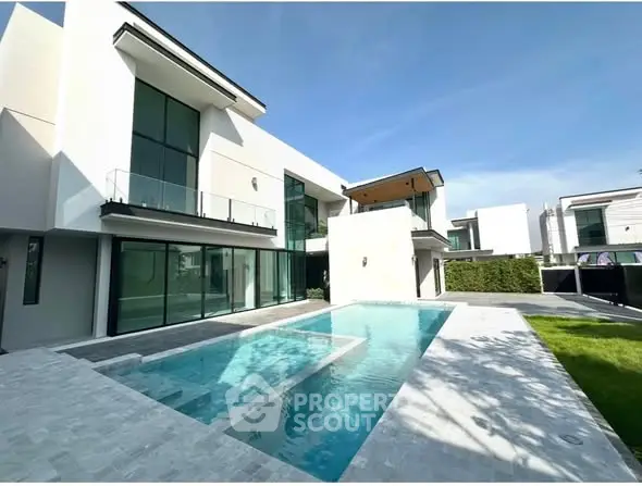 Luxurious modern villa with private pool and spacious outdoor area.