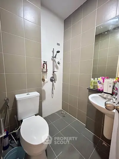 Modern bathroom with sleek tiles and contemporary fixtures