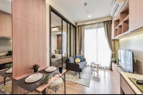 Modern living room with open kitchen and stylish decor