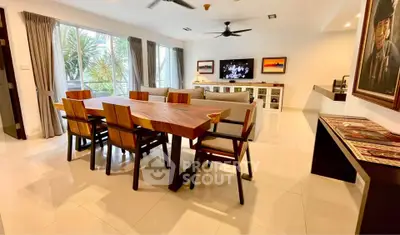 Spacious modern living room with elegant dining area and natural light