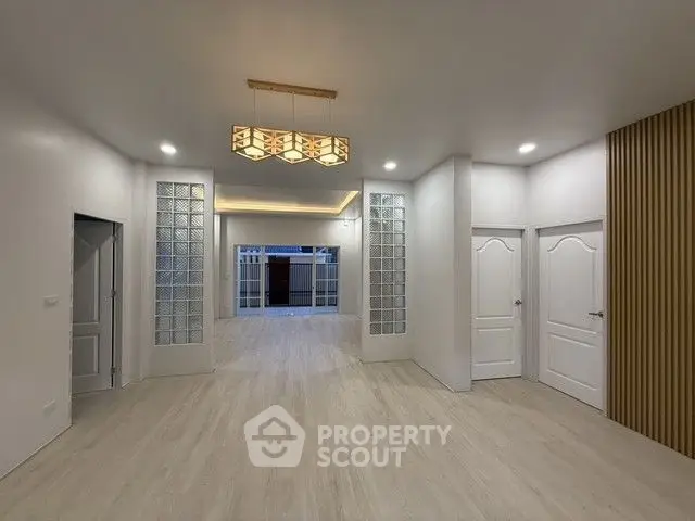 Spacious modern interior with elegant lighting and sleek design