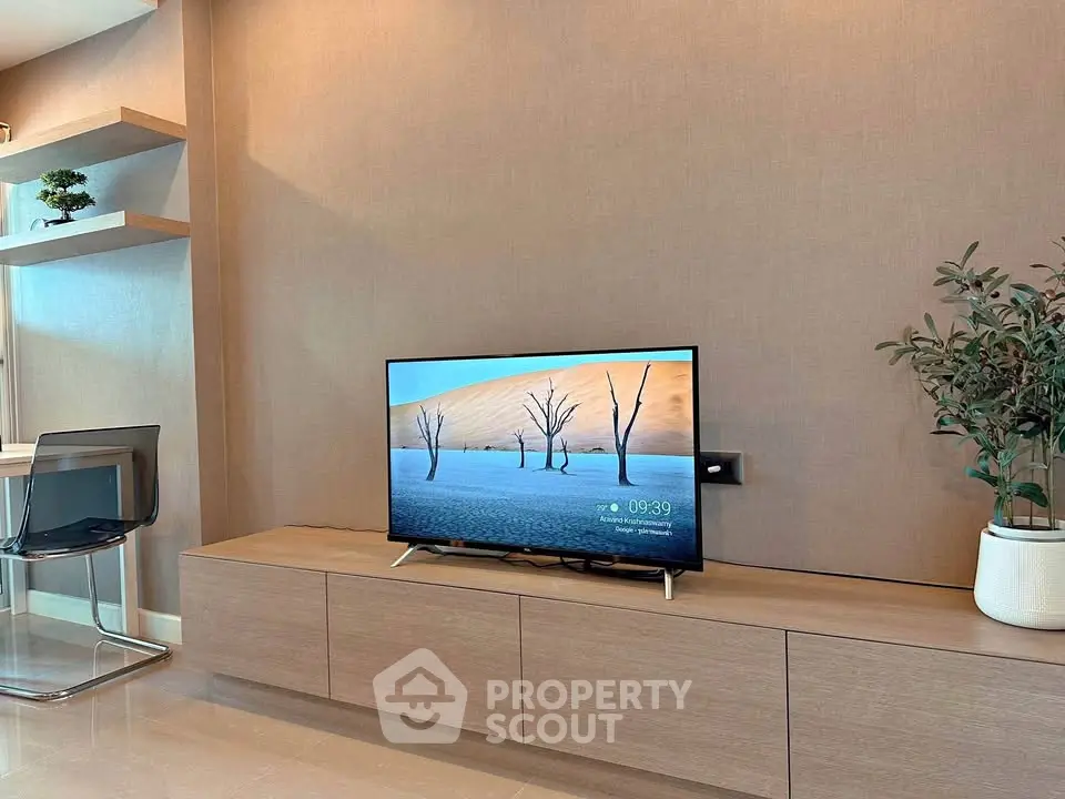 Modern living room with sleek TV setup and stylish decor