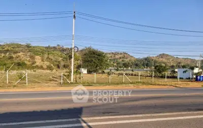 Scenic land plot with road access and mountain views, ideal for development or investment opportunities.