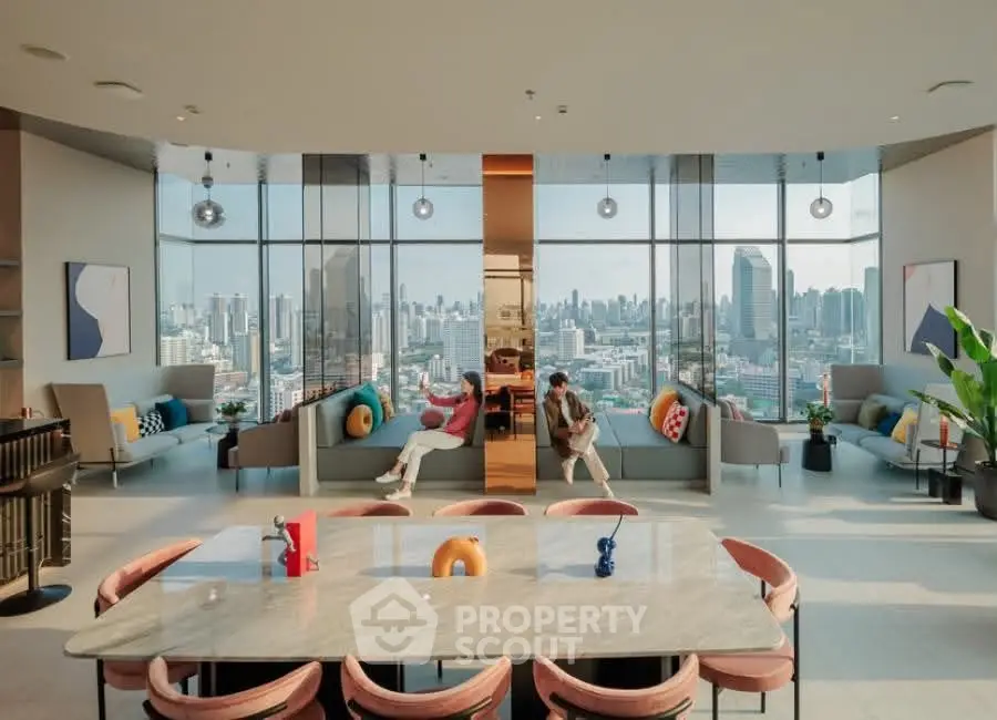 Luxurious modern living room with panoramic city views and stylish decor