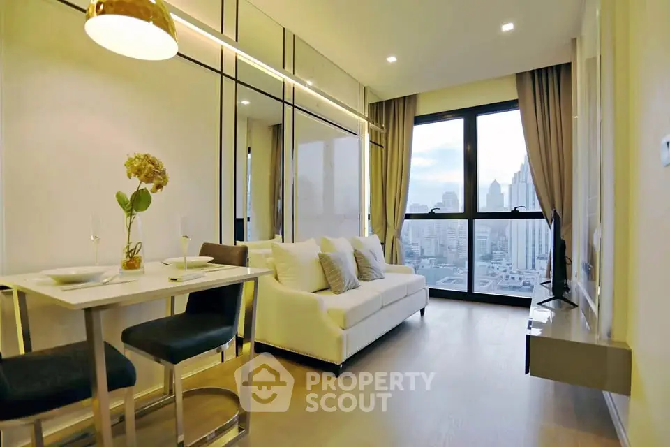 Modern living room with city view, sleek furniture, and elegant decor in a high-rise apartment.
