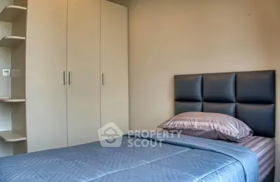 Cozy bedroom with modern design and ample storage space