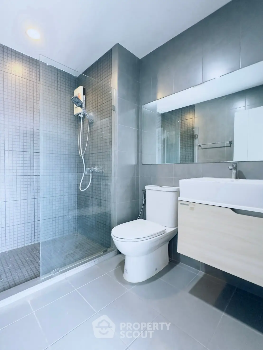 Modern bathroom with sleek design and glass shower enclosure