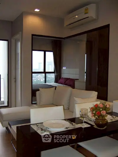 Modern living room with dining area and city view in stylish apartment