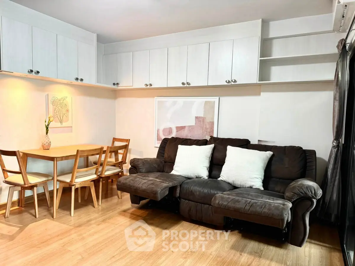 Cozy living room with modern furniture and stylish decor, perfect for relaxation and entertaining guests.