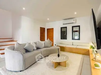 Modern living room with stylish furniture and cozy ambiance