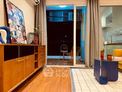 Stylish living room with modern decor and balcony access