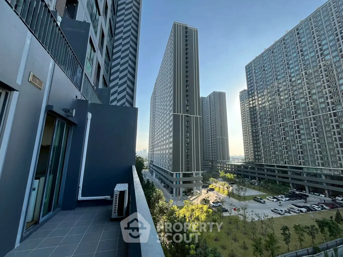 Stunning high-rise apartment view with modern architecture and lush greenery