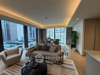 Luxurious modern living room with panoramic city views and elegant furnishings.