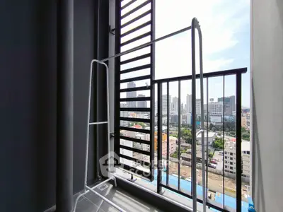 Modern balcony with city view and sleek railing design