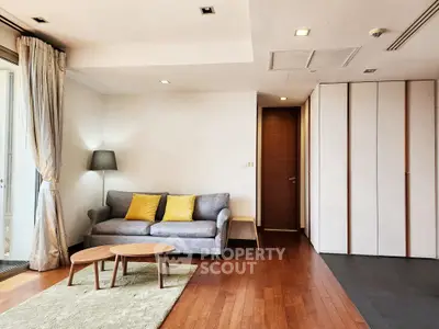Spacious living room with modern decor and natural light