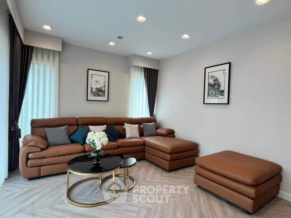 Luxurious living room with modern leather sofa and elegant decor