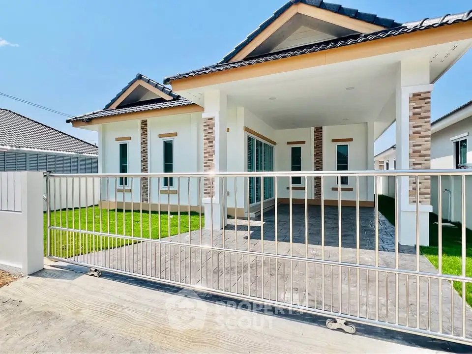 Charming single-story home with modern design and spacious front yard