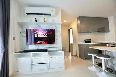 Modern living room with open kitchen and stylish decor