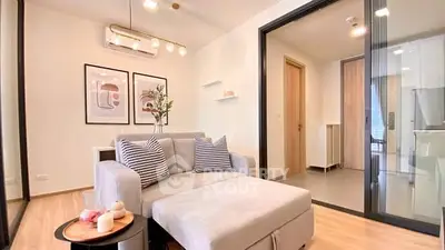 Modern living room with stylish decor and open layout in a contemporary apartment.