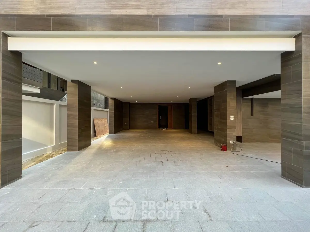 Spacious modern parking area with sleek design and ample lighting