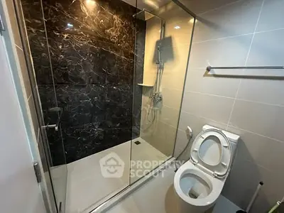 Modern bathroom with glass shower and sleek design