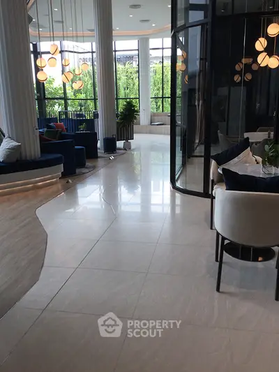 Luxurious modern living room with elegant lighting and large windows