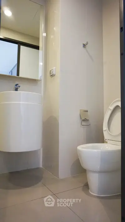 Modern bathroom with sleek fixtures and minimalist design