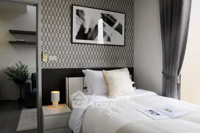 Stylish bedroom with modern decor and cozy ambiance, featuring elegant wallpaper and soft lighting.