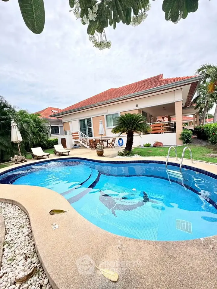 Charming villa with private pool and lush garden, perfect for luxurious living.