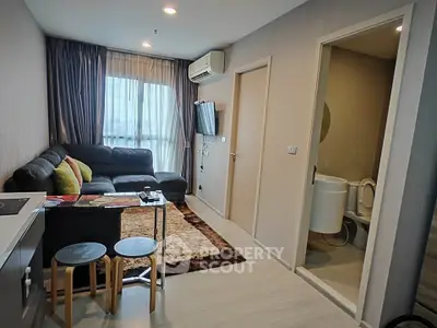 Modern living room with cozy seating and open layout in stylish apartment