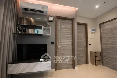 Modern living room with sleek design and air conditioning unit