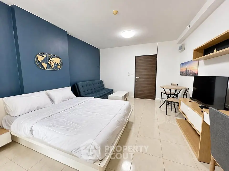 Modern studio apartment with stylish decor and cozy furnishings