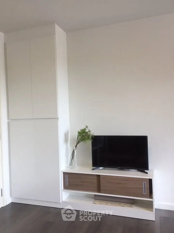 Modern living room with sleek TV stand and minimalist decor