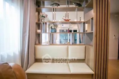 Modern living room with stylish wooden shelving and cozy seating area