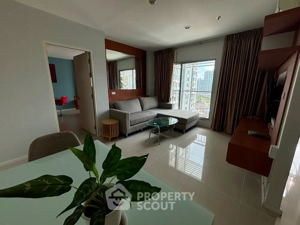 Modern living room with balcony view in a stylish apartment