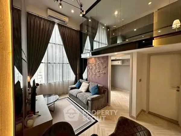 Modern loft apartment with high ceilings and stylish decor