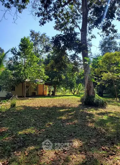 Charming rural property with lush greenery and serene surroundings, perfect for nature lovers seeking tranquility.