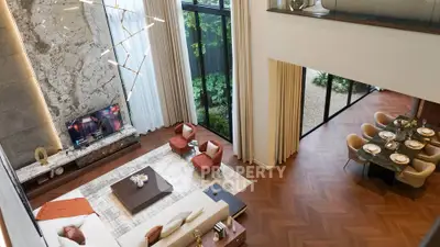 Luxurious modern living room with high ceilings and elegant dining area