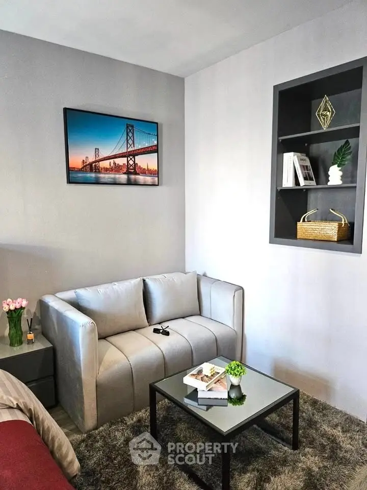 Modern living room with stylish decor and cozy seating area, perfect for relaxation and entertaining.