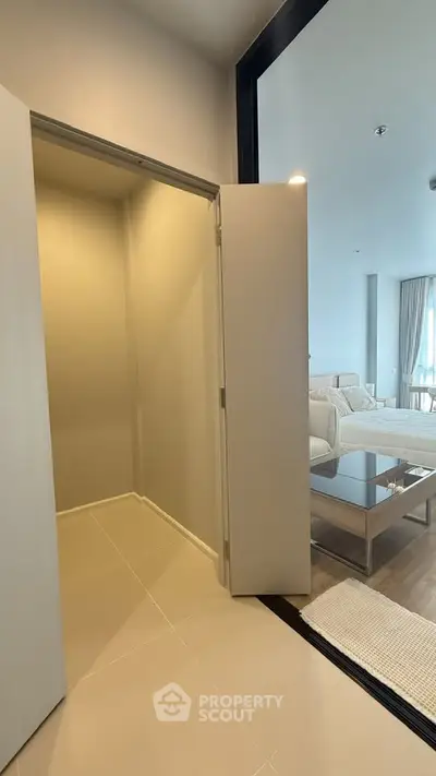 Modern bedroom with glass partition and elegant decor