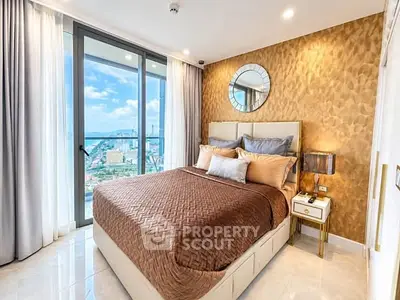 Luxurious bedroom with stunning city view and elegant decor