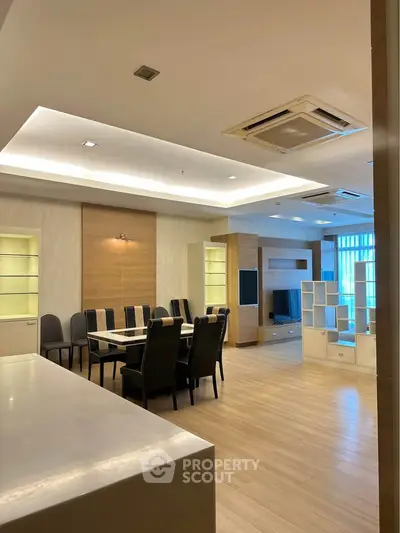 Spacious modern living room with dining area and stylish furniture