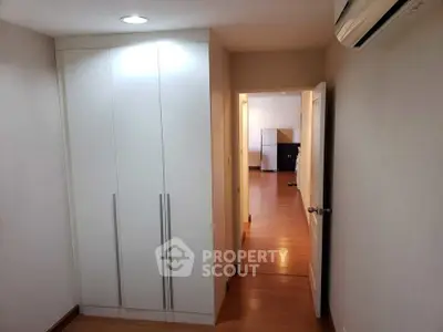 Spacious interior with built-in wardrobe and air conditioning, ideal for modern living.