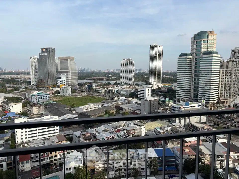 Stunning cityscape view from high-rise balcony overlooking urban skyline.