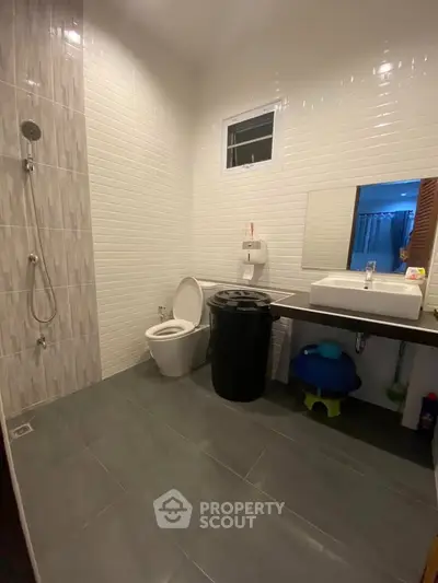 Modern bathroom with sleek design and contemporary fixtures.