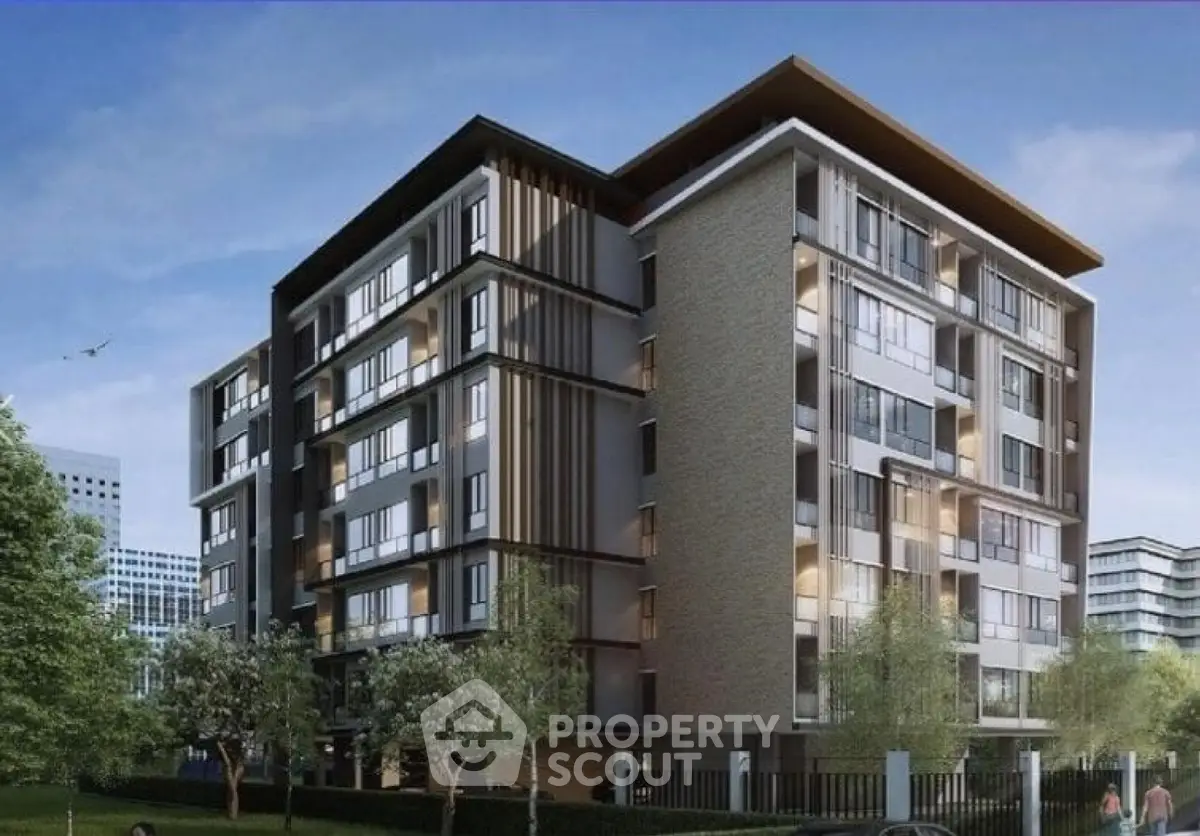 Modern multi-story residential building with sleek design and lush greenery, ideal for urban living.